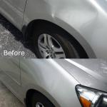 Silver Sedan wheel well repaired with paintless dent repair